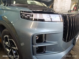 Тонирование оптики полиуретаном на китайском авто